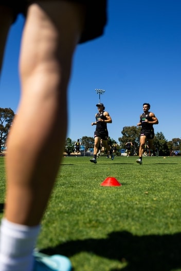Kane McAuliffe, Mykelti Lefau - AFL Training November 24